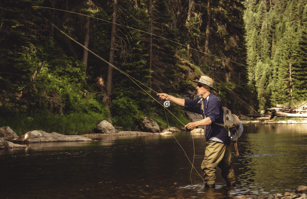 image of a man doing fly fishing