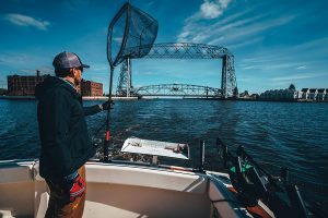 Man Holding A Fishing Net